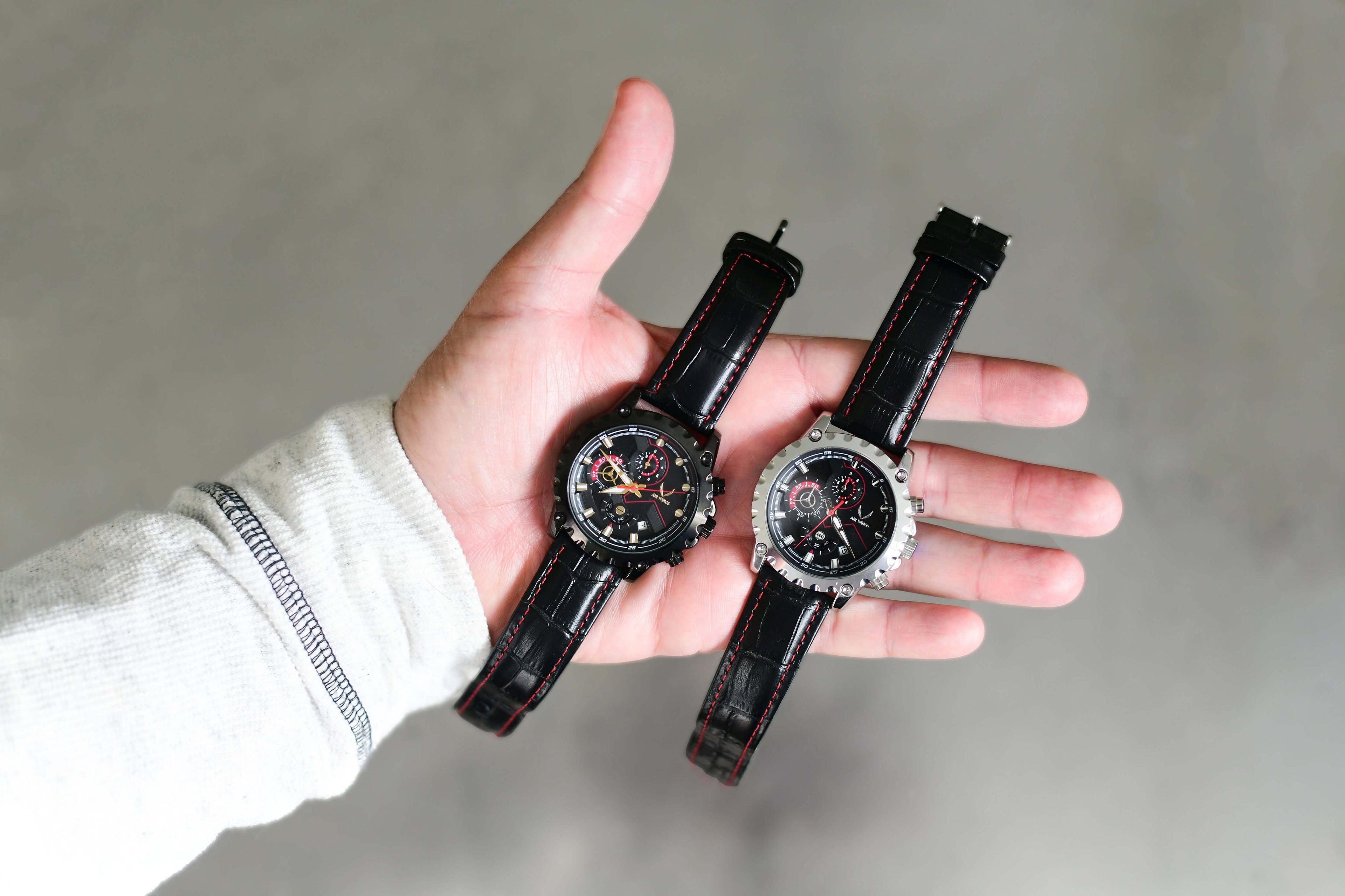 Air Wings Ace - Silver/Black watches displayed on hand, showcasing minimalistic pilot watches Perth.